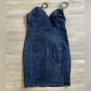 Denim mini dress. Stretchy material, dark wash, gold zipper,